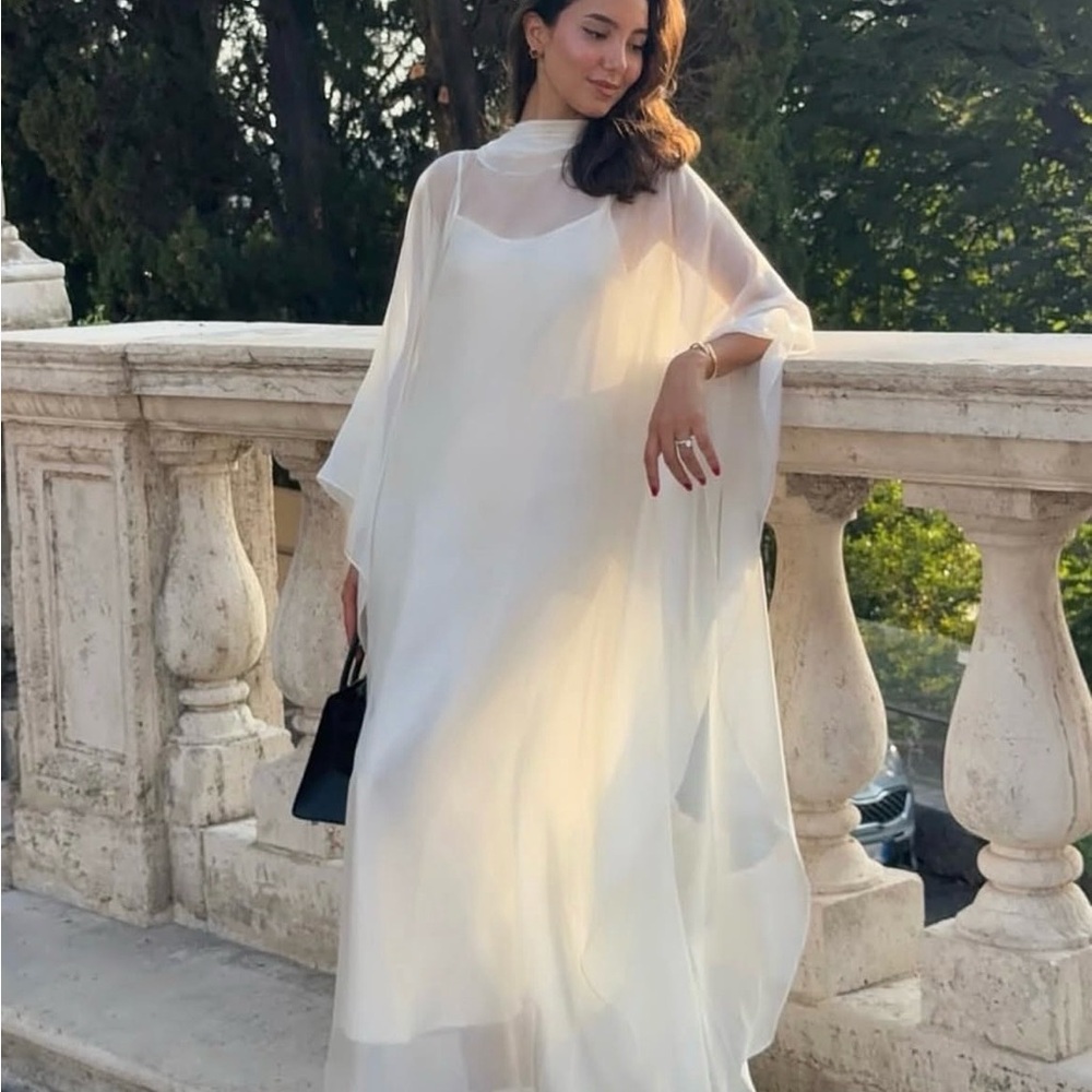 Elegant White Maxi Dress with Sheer Cape Overlay